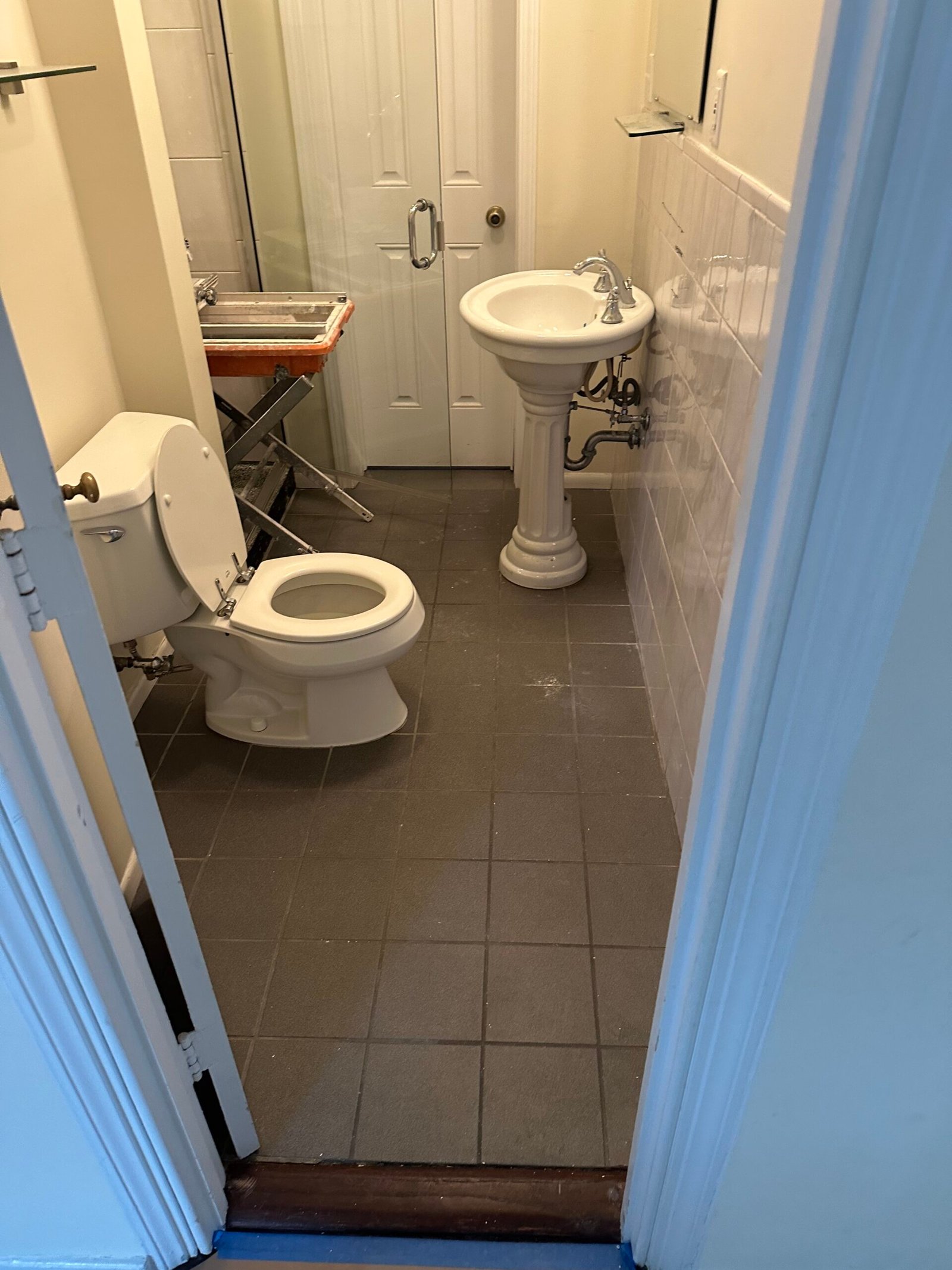 Dated bathroom layout before a complete remodel