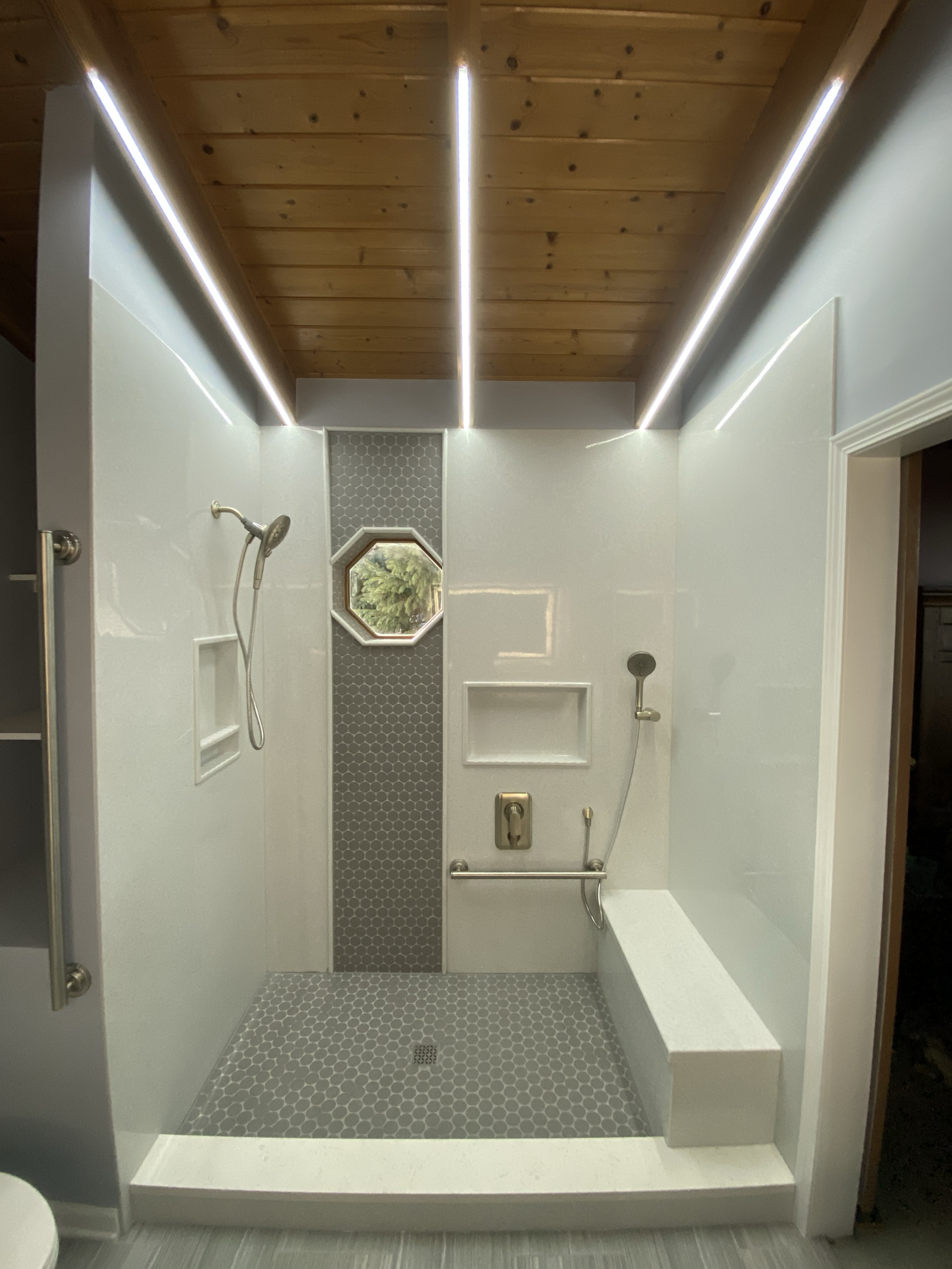 Low-threshold walk-in shower after an ADA bathroom remodel